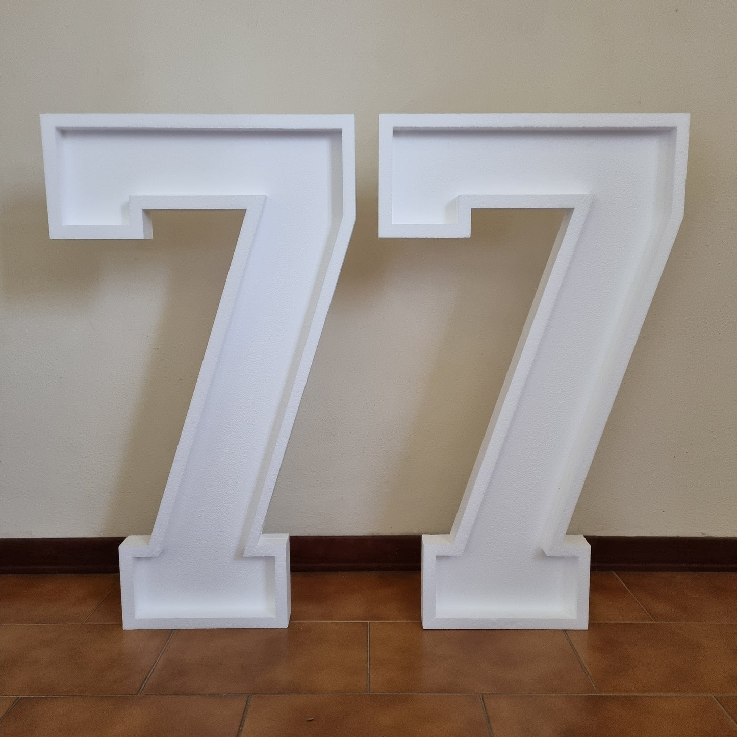 Numero 77 Grande