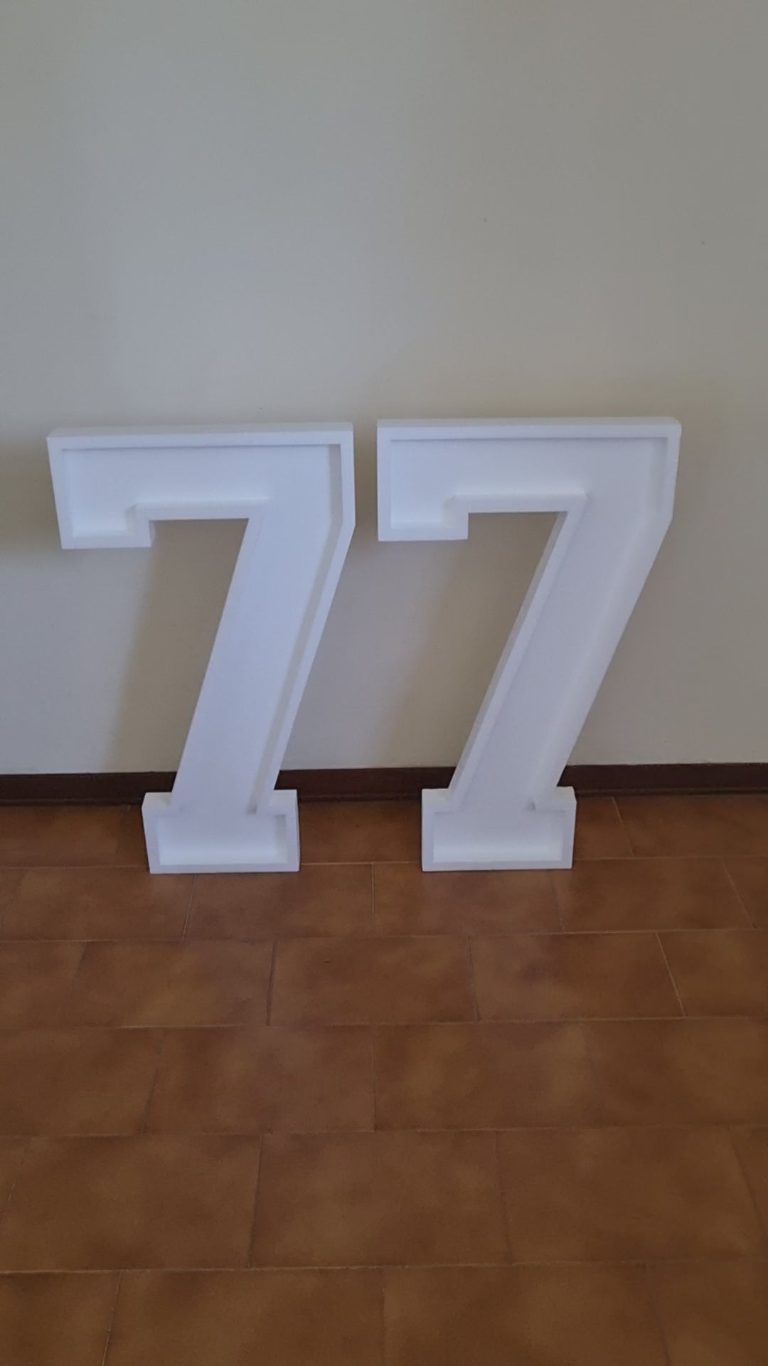 Numero 77 Grande